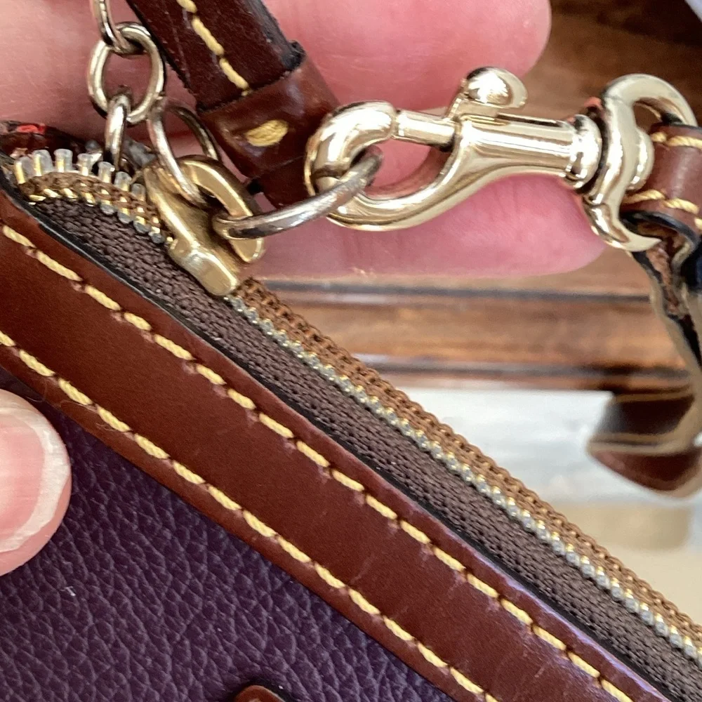 Dooney & Bourke pebbled deep purple and Brown Leather Wristlet, keychain